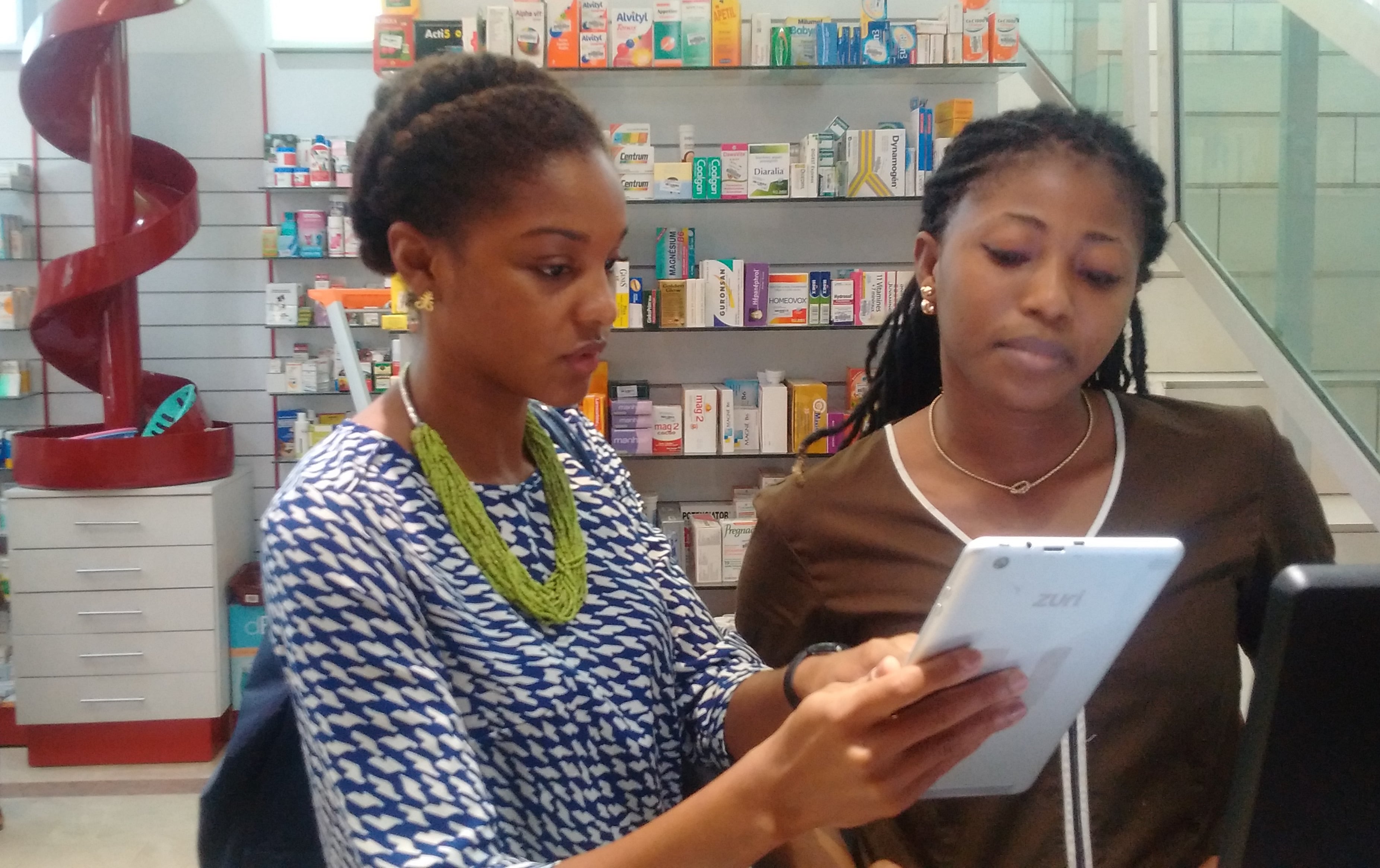 Elsie Sowah of mPharma Digital Healthcare platform, trains a pharmacist